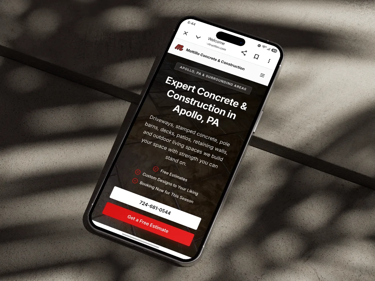 Website built for Mottillo Concrete and Construction in Apollo, Pennsylvania, shown on a phone.